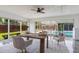Bright office space with ceiling fan, and views of the sparkling pool at 5100 La Croix Ave, Belle Isle, FL 32812