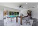 Bright office space with ceiling fan, and views of the sparkling pool at 5100 La Croix Ave, Belle Isle, FL 32812