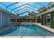 Enjoy the screened-in pool with plenty of room to swim and relax, protected from the elements at 5100 La Croix Ave, Belle Isle, FL 32812