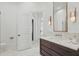 Bathroom features an elegant vanity with marble countertop and gold hardware, and a doorway to another room at 5550 Osprey Isle Ln, Orlando, FL 32819