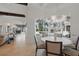 A well-appointed dining room with a view of the pool and outdoor space at 5550 Osprey Isle Ln, Orlando, FL 32819