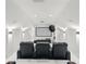Spacious home theater with tiered seating, perfect for Gathering movie nights and entertaining guests at 5550 Osprey Isle Ln, Orlando, FL 32819