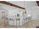 Bright kitchen boasts a large center island, pendant lighting, and stainless steel appliances at 5550 Osprey Isle Ln, Orlando, FL 32819