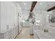 Bright kitchen featuring marble countertops, custom cabinetry, and stainless steel appliances at 5550 Osprey Isle Ln, Orlando, FL 32819