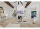 Stylish living room with a fireplace, ceiling fan, and a view of the backyard at 5550 Osprey Isle Ln, Orlando, FL 32819
