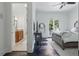 Beautiful main bedroom connected to a bathroom with modern finishes, and a private outdoor balcony at 5550 Osprey Isle Ln, Orlando, FL 32819
