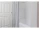 Neat and clean bathroom featuring a shower curtain at 5953 Westgate Dr # 1823, Orlando, FL 32835