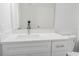Bathroom featuring a modern white vanity with stone countertop, contemporary faucet, and a toilet at 5953 Westgate Dr # 1823, Orlando, FL 32835