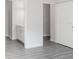 A bedroom with a door leading to the bathroom showing the vanity at 5953 Westgate Dr # 1823, Orlando, FL 32835