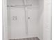 The laundry room has a utility sink and a built-in wire shelf above the machines at 5953 Westgate Dr # 1823, Orlando, FL 32835