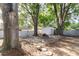 Exterior view of backyard with patio and detached garage at 7333 Radiant Cir, Orlando, FL 32810