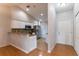 Modern kitchen features granite countertops, stainless steel appliances and white cabinets at 7333 Radiant Cir, Orlando, FL 32810