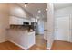 Cozy kitchen features granite countertops, stainless steel appliances and white cabinets at 7333 Radiant Cir, Orlando, FL 32810