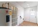 Laundry room with tile floor and water heater at 7333 Radiant Cir, Orlando, FL 32810