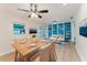 Inviting dining area with modern furnishings, built-in shelving, and lots of natural light at 735 Baltimore Dr, Orlando, FL 32810