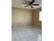 Bedroom with ceiling fan, neutral colors, and tile flooring at 840 Lake Jackson Cir, Apopka, FL 32703