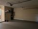 View of the garage with shelves, storage, and painted floors at 840 Lake Jackson Cir, Apopka, FL 32703