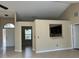 Open-concept living area offering great natural light and views of entryway and kitchen at 840 Lake Jackson Cir, Apopka, FL 32703