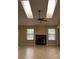 Bright living room featuring tile floors, a ceiling fan, and fireplace at 840 Lake Jackson Cir, Apopka, FL 32703