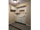Wet bar area with a sink, white cabinets, and tiled countertop at 840 Lake Jackson Cir, Apopka, FL 32703