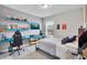 bedroom with playful decor, a comfortable bed, and a functional desk area at 8768 Sonoma Coast Dr, Winter Garden, FL 34787