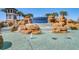 Picturesque Waterleigh community entrance featuring a stunning rock waterfall with a blue-tiled fountain at 8768 Sonoma Coast Dr, Winter Garden, FL 34787