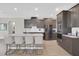 Modern kitchen with a large island, stainless steel appliances, and plenty of cabinet space at 8768 Sonoma Coast Dr, Winter Garden, FL 34787
