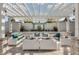 Inviting outdoor lounge area offering ample seating, a pergola, and a tranquil ambiance at 8768 Sonoma Coast Dr, Winter Garden, FL 34787