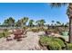 Charming outdoor patio area with multiple seating arrangements, perfect for socializing and enjoying the scenery at 8768 Sonoma Coast Dr, Winter Garden, FL 34787