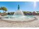 Fun splash pad area featuring an umbrella fountain, perfect for Gathering fun in the sun at the community pool at 8768 Sonoma Coast Dr, Winter Garden, FL 34787