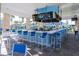 Bar area with a large countertop, comfortable seating, and multiple TVs at 880 Paradise Dr, Davenport, FL 33897