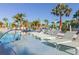 Beautiful lounge chairs lining the community pool, perfect for relaxation at 880 Paradise Dr, Davenport, FL 33897