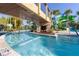 Fun lazy river with waterfall features and exciting water slides in the background at 880 Paradise Dr, Davenport, FL 33897