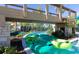 Relaxing lazy river at Windsor Island Resort, featuring a charming bridge and lush greenery at 880 Paradise Dr, Davenport, FL 33897