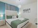 Beautiful bedroom featuring modern lighting fixtures and neutral decor at 880 Paradise Dr, Davenport, FL 33897
