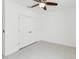 This bedroom features ample closet space and tile flooring at 928 Avenal Ln, Davenport, FL 33837