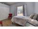 Well-lit bedroom featuring a closet, a window and neutral colors at 929 Monroe Harbor Pl, Sanford, FL 32773