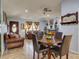Spacious living and dining area with neutral walls and tile flooring at 929 Monroe Harbor Pl, Sanford, FL 32773
