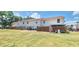 Spacious backyard featuring a privacy fence and ample green space for outdoor enjoyment at 980 Canal View Blvd # N2, Port Orange, FL 32129