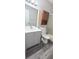 Bathroom features updated vanity, fixtures, and walk-in shower at 980 Canal View Blvd # N2, Port Orange, FL 32129