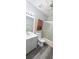 Bathroom features updated vanity, fixtures, and walk-in shower at 980 Canal View Blvd # N2, Port Orange, FL 32129