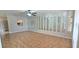 Bright living room features decorative tile flooring and mirror accents throughout at 980 Canal View Blvd # N2, Port Orange, FL 32129