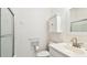 Clean bathroom featuring a toilet, sink, cabinet and a shower with glass door at 13241 Fountainbleau Dr, Clermont, FL 34711