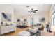 Open-concept living room and dining area with modern furnishings at 13241 Fountainbleau Dr, Clermont, FL 34711