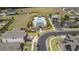 Aerial view highlighting a community pool, cabana, and lush landscaping within a well-planned neighborhood at 3302 Stonegate Dr, Ocoee, FL 34761