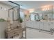 Gorgeous bathroom with a glass enclosed shower, dual sinks, and granite counters at 3302 Stonegate Dr, Ocoee, FL 34761
