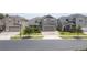 Exterior elevation showing a two-story home with a brick driveway and a well-maintained front yard at 3302 Stonegate Dr, Ocoee, FL 34761
