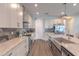 Bright kitchen with granite countertops, stainless steel appliances, and ample cabinet space for storage at 3302 Stonegate Dr, Ocoee, FL 34761