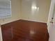 Bedroom featuring hardwood floors and neutral colored walls at 1079 S Hiawassee Rd # 1121, Orlando, FL 32835