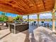 Outdoor grilling area with lake view at 1079 S Hiawassee Rd # 1121, Orlando, FL 32835